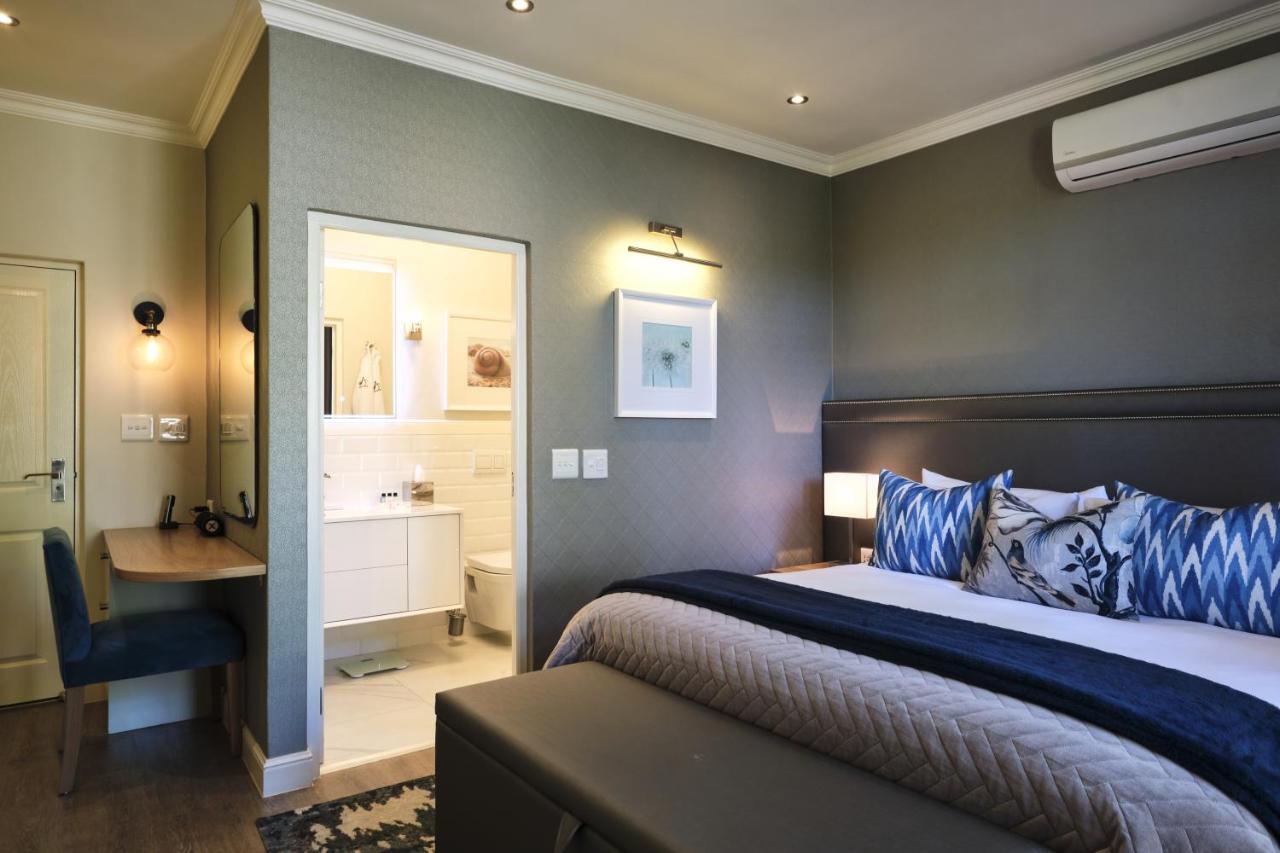 Alluvia Boutique Winery & Luxury Accommodation Стеленбош Екстериор снимка A bedroom at the Oyster Box