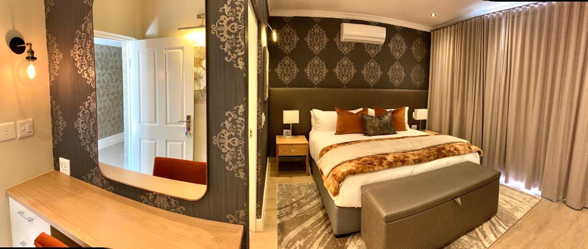 Alluvia Boutique Winery & Luxury Accommodation Стеленбош Стая снимка A bedroom at the Cape Heritage